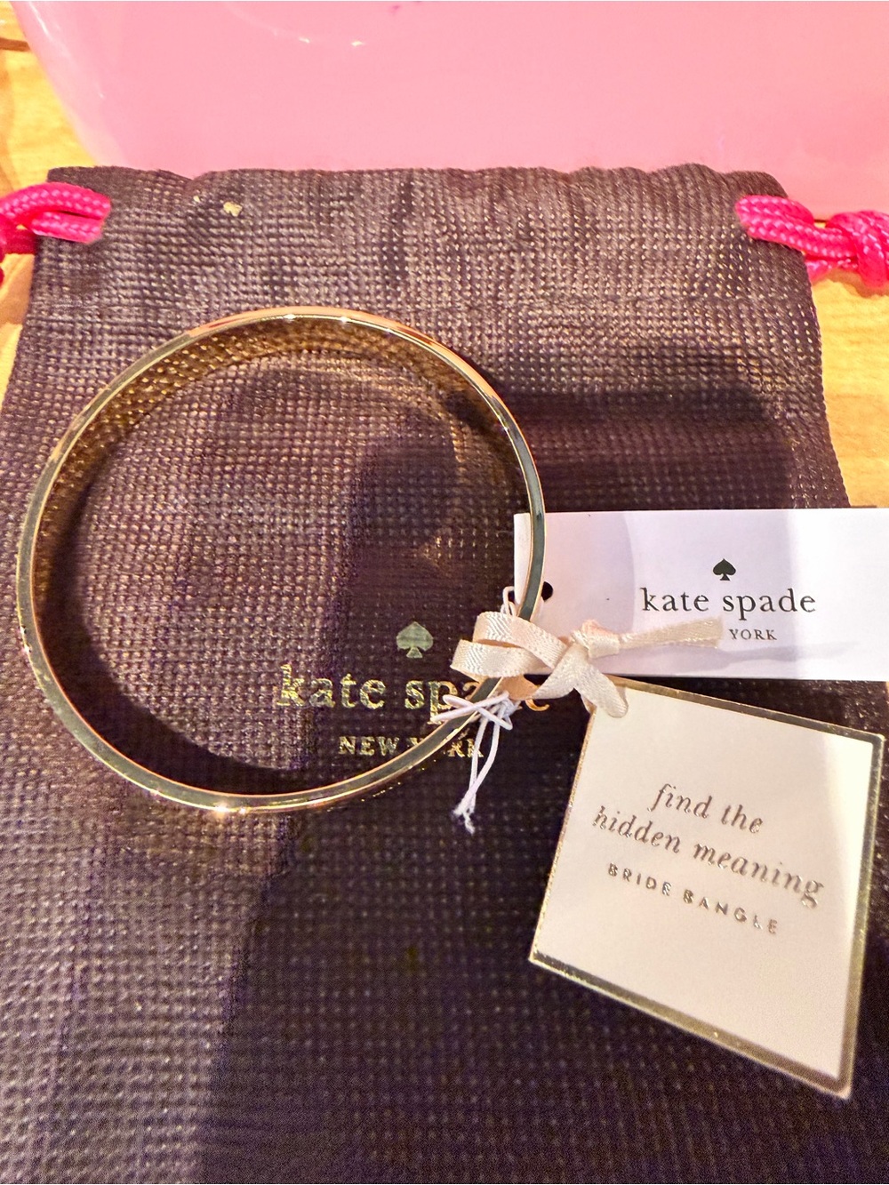 kate spade gold-tone brides bangle with bow tag
